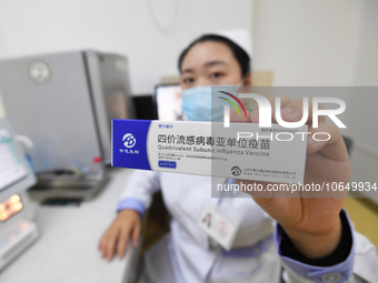 GUIYANG, CHINA - OCTOBER 17, 2023 - A medical worker shows China's first quadrivalent subunit influenza vaccine at a community health servic...