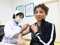 GUIYANG, CHINA - OCTOBER 17, 2023 - A medical worker inoculates people with China's first quadrivalent subunit influenza vaccine at a commun...