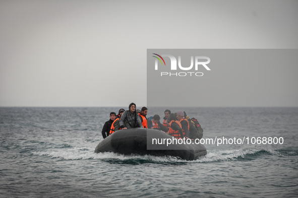 Refugees and migrants on a rubber boat arrive in Mytilene, island of Lesbos, Greece, on February 24, 2016. More than 110,000 migrants and re...