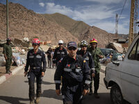 The Spanish rescue team Ericam works with Moroccan firefighters during an operation near the village of Talat N'Yaabouq in the Atlas Mountai...