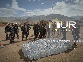 The Spanish rescue team Ericam works with Moroccan firefighters during an operation near the village of Talat N'Yaabouq in the Atlas Mountai...