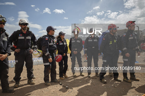 The Spanish rescue team Ericam works with Moroccan firefighters during an operation near the village of Talat N'Yaabouq in the Atlas Mountai...