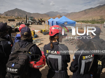 The Spanish rescue team Ericam works with Moroccan firefighters during an operation near the village of Talat N'Yaabouq in the Atlas Mountai...