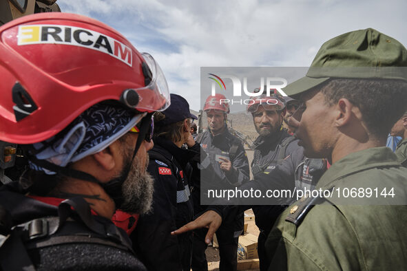 The Spanish rescue team Ericam works with Moroccan firefighters during an operation near the village of Talat N'Yaabouq in the Atlas Mountai...