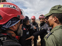 The Spanish rescue team Ericam works with Moroccan firefighters during an operation near the village of Talat N'Yaabouq in the Atlas Mountai...