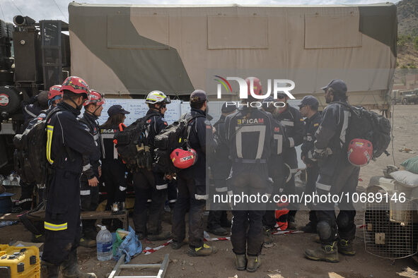 The Spanish rescue team Ericam works with Moroccan firefighters during an operation near the village of Talat N'Yaabouq in the Atlas Mountai...