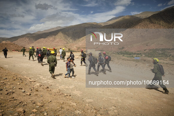 The Spanish rescue team Ericam works with Moroccan firefighters during an operation near the village of Talat N'Yaabouq in the Atlas Mountai...