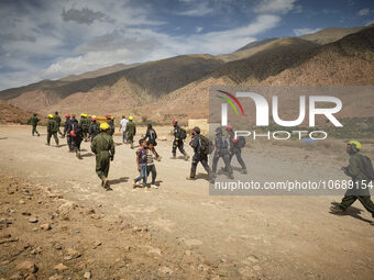 The Spanish rescue team Ericam works with Moroccan firefighters during an operation near the village of Talat N'Yaabouq in the Atlas Mountai...