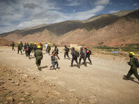 The Spanish rescue team Ericam works with Moroccan firefighters during an operation near the village of Talat N'Yaabouq in the Atlas Mountai...