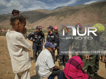 The Spanish rescue team Ericam works with Moroccan firefighters during an operation near the village of Talat N'Yaabouq in the Atlas Mountai...