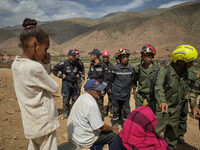 The Spanish rescue team Ericam works with Moroccan firefighters during an operation near the village of Talat N'Yaabouq in the Atlas Mountai...