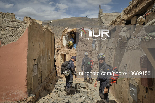 The Spanish rescue team Ericam works with Moroccan firefighters during an operation near the village of Talat N'Yaabouq in the Atlas Mountai...