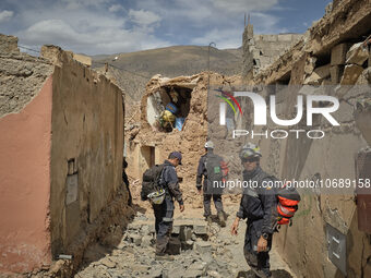 The Spanish rescue team Ericam works with Moroccan firefighters during an operation near the village of Talat N'Yaabouq in the Atlas Mountai...