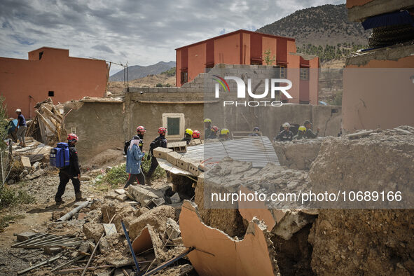 The Spanish rescue team Ericam works with Moroccan firefighters during an operation near the village of Talat N'Yaabouq in the Atlas Mountai...