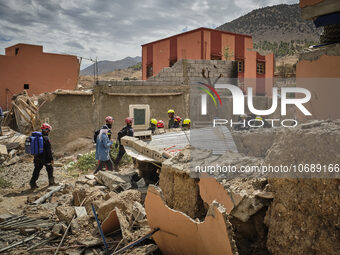 The Spanish rescue team Ericam works with Moroccan firefighters during an operation near the village of Talat N'Yaabouq in the Atlas Mountai...