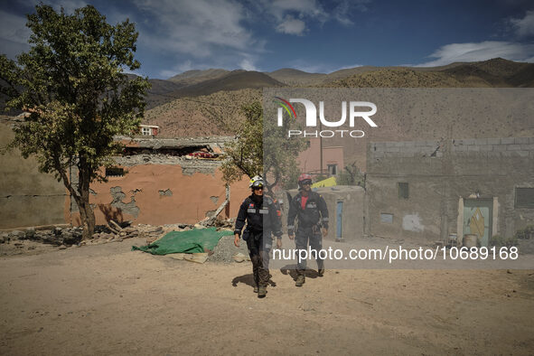 The Spanish rescue team Ericam works with Moroccan firefighters during an operation near the village of Talat N'Yaabouq in the Atlas Mountai...