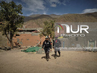 The Spanish rescue team Ericam works with Moroccan firefighters during an operation near the village of Talat N'Yaabouq in the Atlas Mountai...