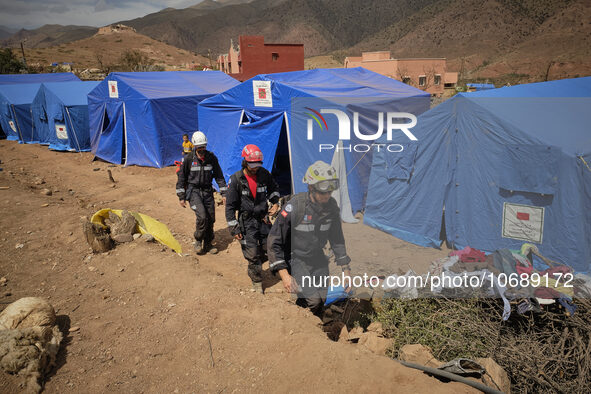 The Spanish rescue team Ericam works with Moroccan firefighters during an operation near the village of Talat N'Yaabouq in the Atlas Mountai...