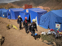 The Spanish rescue team Ericam works with Moroccan firefighters during an operation near the village of Talat N'Yaabouq in the Atlas Mountai...