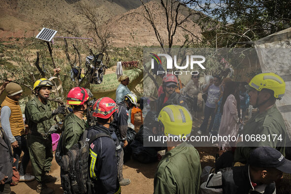 The Spanish rescue team Ericam works with Moroccan firefighters during an operation near the village of Talat N'Yaabouq in the Atlas Mountai...