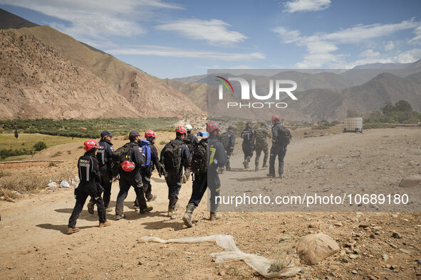 The Spanish rescue team Ericam works with Moroccan firefighters during an operation near the village of Talat N'Yaabouq in the Atlas Mountai...