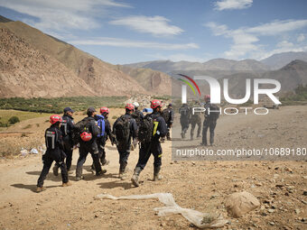 The Spanish rescue team Ericam works with Moroccan firefighters during an operation near the village of Talat N'Yaabouq in the Atlas Mountai...