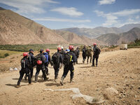 The Spanish rescue team Ericam works with Moroccan firefighters during an operation near the village of Talat N'Yaabouq in the Atlas Mountai...