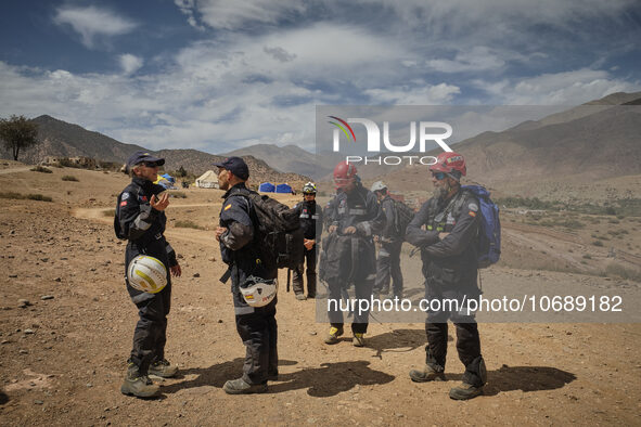 The Spanish rescue team Ericam works with Moroccan firefighters during an operation near the village of Talat N'Yaabouq in the Atlas Mountai...