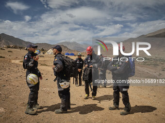 The Spanish rescue team Ericam works with Moroccan firefighters during an operation near the village of Talat N'Yaabouq in the Atlas Mountai...