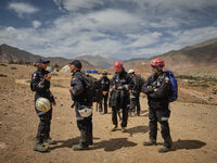 The Spanish rescue team Ericam works with Moroccan firefighters during an operation near the village of Talat N'Yaabouq in the Atlas Mountai...