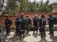 The Spanish rescue team Ericam works with Moroccan firefighters during an operation near the village of Talat N'Yaabouq in the Atlas Mountai...