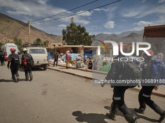 The Spanish rescue team Ericam works with Moroccan firefighters during an operation near the village of Talat N'Yaabouq in the Atlas Mountai...