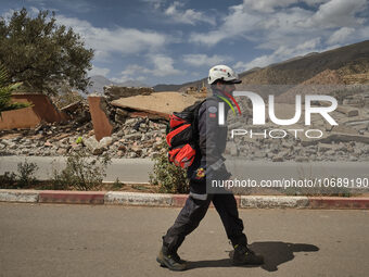 The Spanish rescue team Ericam works with Moroccan firefighters during an operation near the village of Talat N'Yaabouq in the Atlas Mountai...