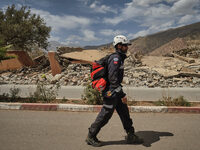 The Spanish rescue team Ericam works with Moroccan firefighters during an operation near the village of Talat N'Yaabouq in the Atlas Mountai...