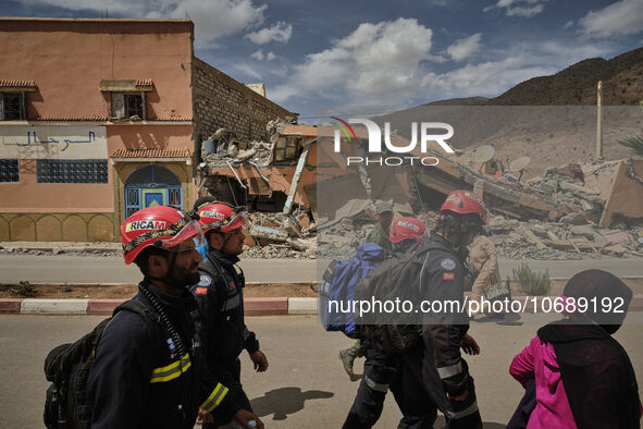 The Spanish rescue team Ericam works with Moroccan firefighters during an operation near the village of Talat N'Yaabouq in the Atlas Mountai...