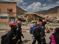 The Spanish rescue team Ericam works with Moroccan firefighters during an operation near the village of Talat N'Yaabouq in the Atlas Mountai...