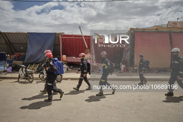 The Spanish rescue team Ericam works with Moroccan firefighters during an operation near the village of Talat N'Yaabouq in the Atlas Mountai...