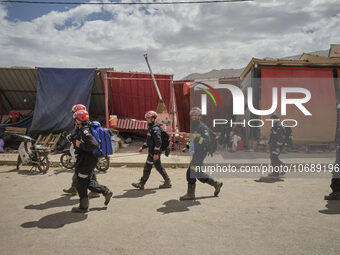 The Spanish rescue team Ericam works with Moroccan firefighters during an operation near the village of Talat N'Yaabouq in the Atlas Mountai...