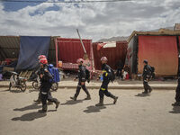 The Spanish rescue team Ericam works with Moroccan firefighters during an operation near the village of Talat N'Yaabouq in the Atlas Mountai...