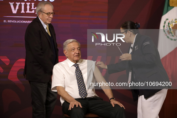 October 24, 2023, Mexico City, Mexico: The President of Mexico, Andres Manuel Lopez Obrador gets vaccinated against influenza and Covid19 du...