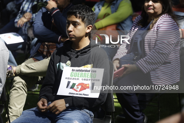 October 25, 2023, Mexico City, Mexico: Attendees of the China Cultural Festival in Los Pinos show posters in support of those affected in Ac...