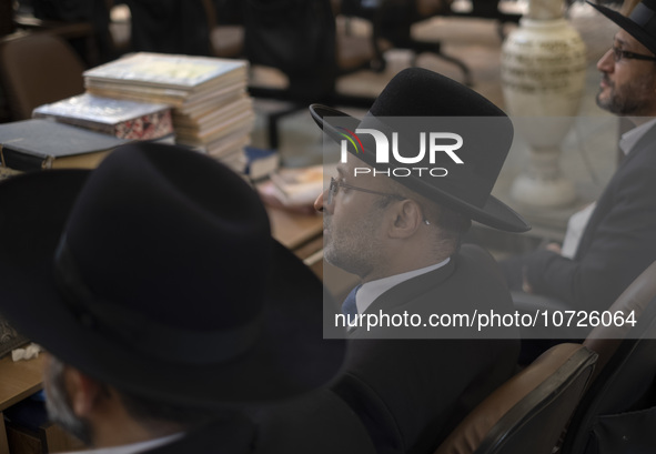 Unidentified Jewish Rabbis sit at a synagogue in downtown Tehran during a gathering to protest against Israeli attacks on Palestinian civili...