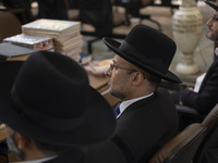 Unidentified Jewish Rabbis sit at a synagogue in downtown Tehran during a gathering to protest against Israeli attacks on Palestinian civili...