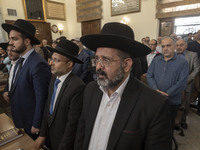 Rabbi Younes Hamami Lalehzar (C), Leader of Iranian Jews, stands next to two other Jewish Rabbis, at a synagogue in downtown Tehran during a...