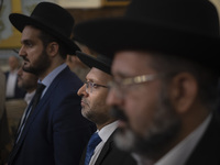 Jewish Rabbis stand at a synagogue in downtown Tehran during a gathering to protest against Israeli attacks on Palestinian civilians, Octobe...