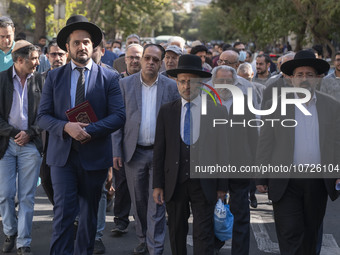 Rabbi Younes Hamami Lalehzar (R), Leader of Iranian Jews, and two other Jewish Rabbis, walk during a rally  in support of Palestine, in down...