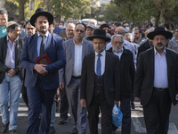 Rabbi Younes Hamami Lalehzar (R), Leader of Iranian Jews, and two other Jewish Rabbis, walk during a rally  in support of Palestine, in down...