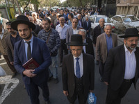 Rabbi Younes Hamami Lalehzar (R), Leader of Iranian Jews, and two other Jewish Rabbis, walk during a rally  in support of Palestine, in down...