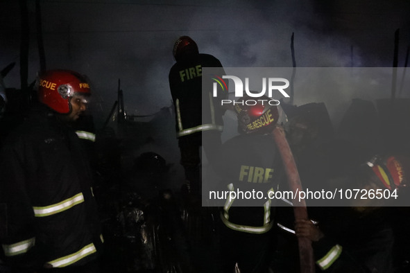 Fire service personnel from Bangladesh are currently extinguishing a fire in Baburhat, Narsingdi, Bangladesh, on October 30, 2023. Baburhat...