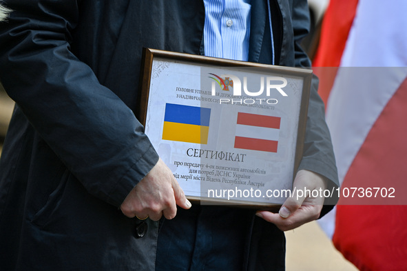 LVIV, UKRAINE - OCTOBER 30, 2023 - A certificate is pictured during the ceremony to convey firefighting equipment from the government of Aus...